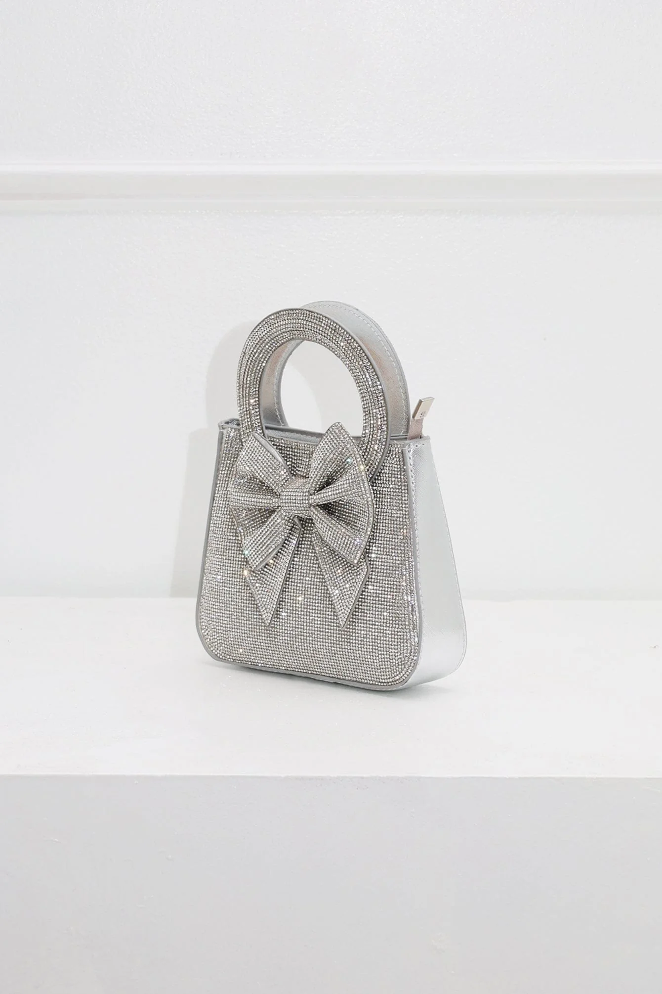 7225-Sweet-Yet-Bold-Bow-Clutch-6.webp Sweet Yet Bold Bow Clutch