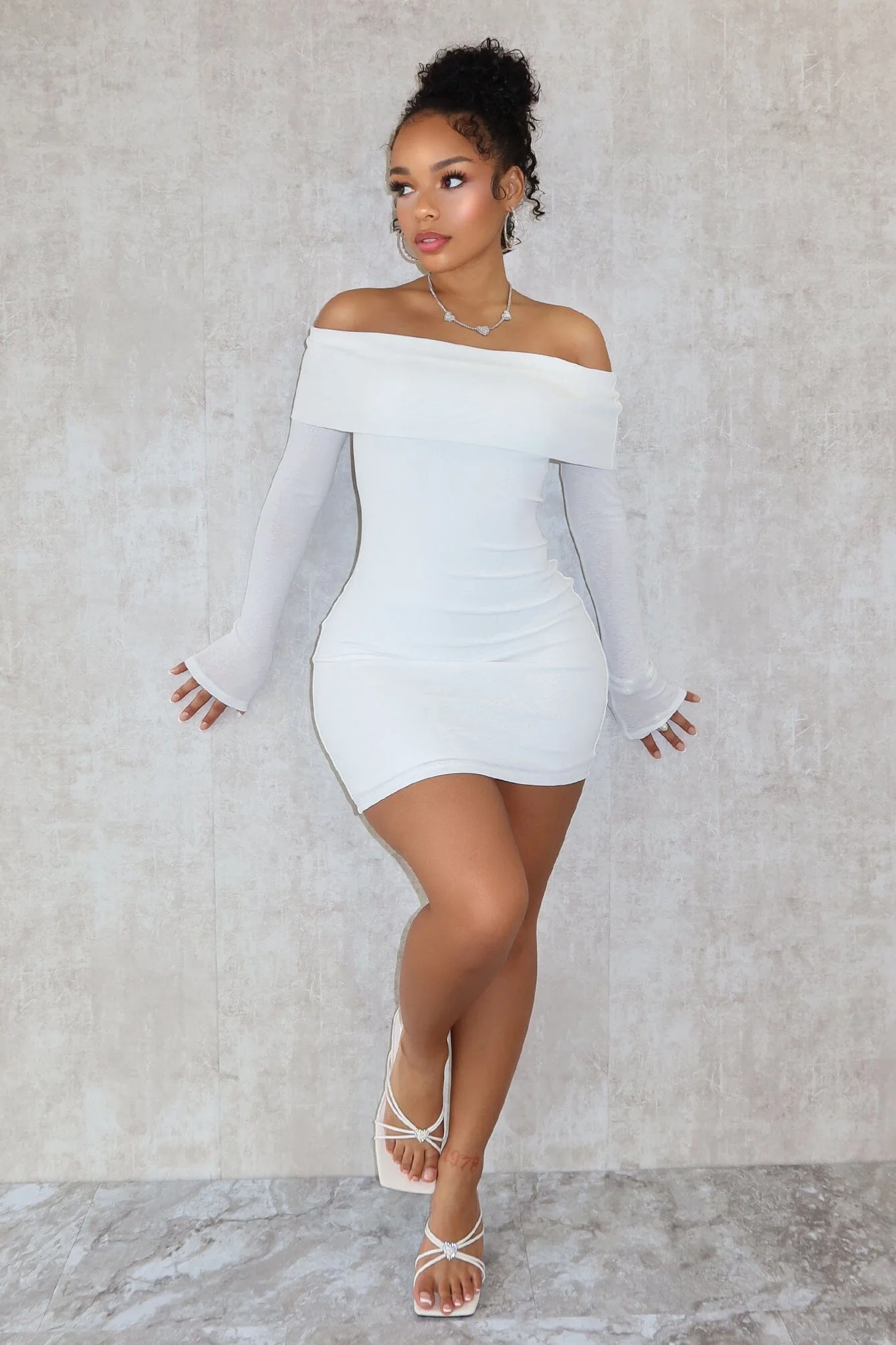 7949-A-Classic-Off-Shoulder-Long-Sleeve-Mini-Dress-3.webp A Classic Off Shoulder Long Sleeve Mini Dress